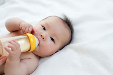 baby drinking from bottle