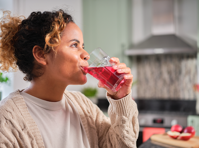 woman drinking fortified beverage